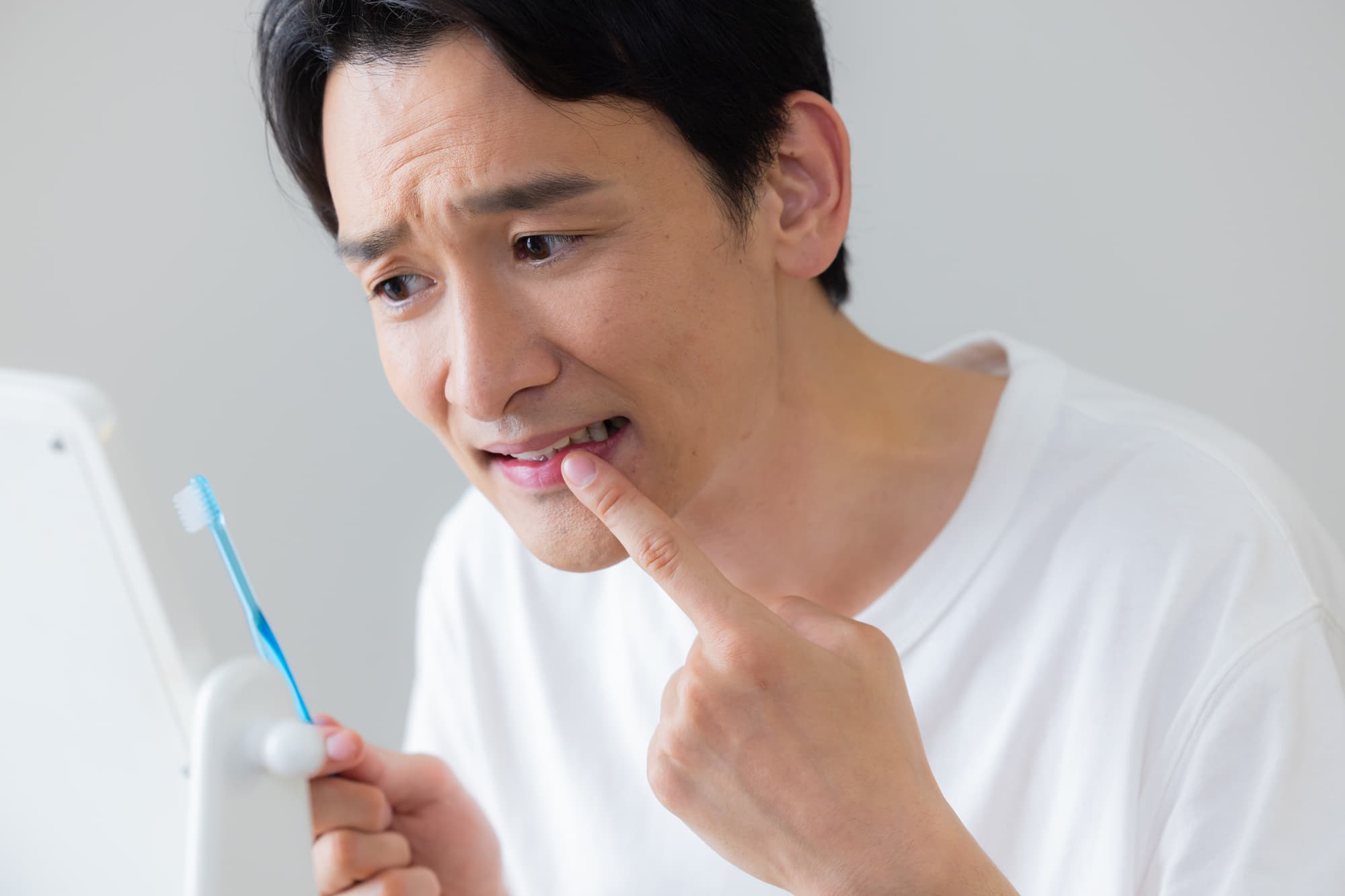 歯周病になった男性